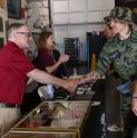 Dean Banush shaking hands at the Vietnam Veterns event. 