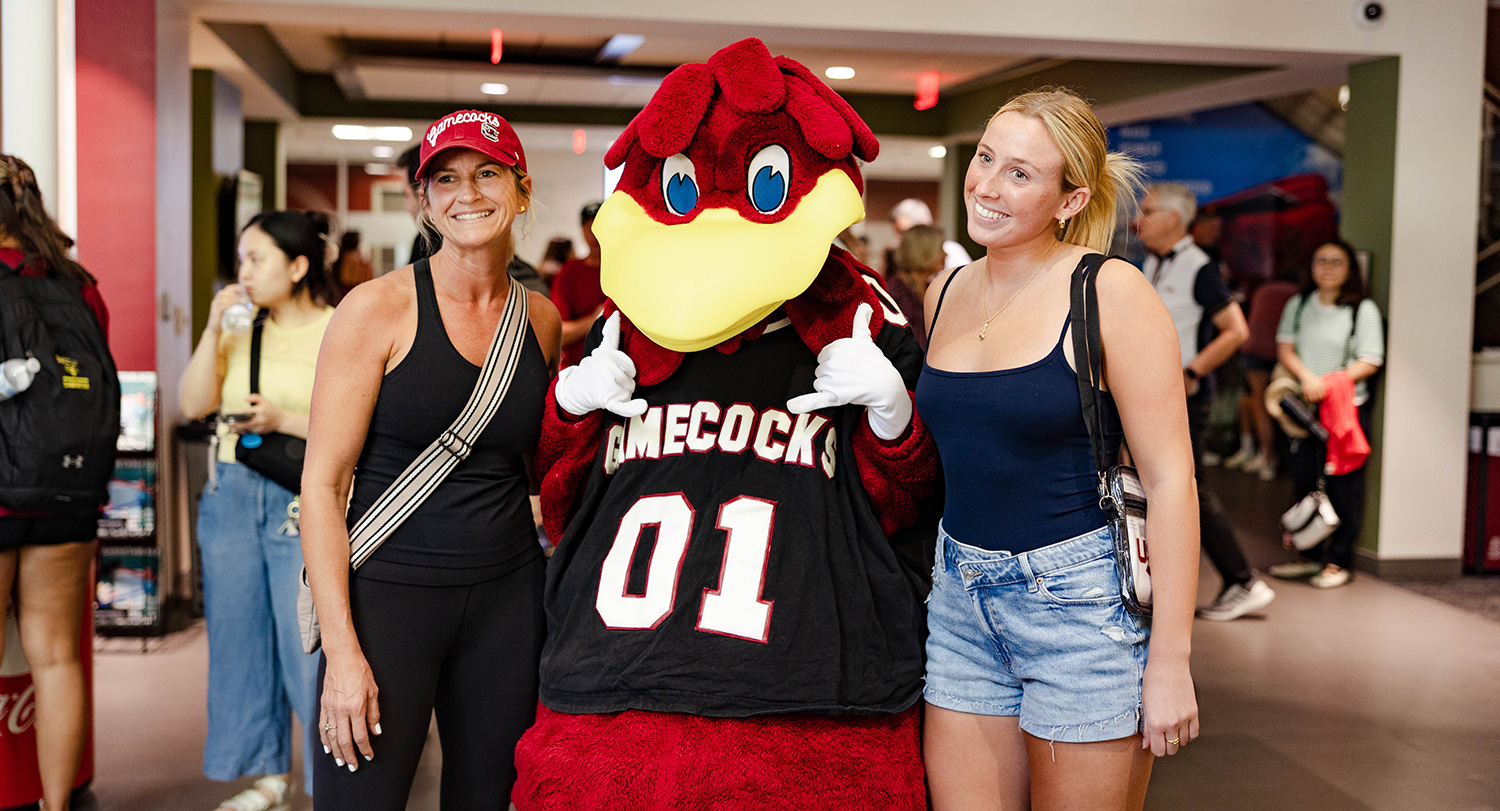 Family posing with Cocky