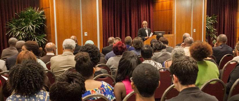 person giving a talk to a group