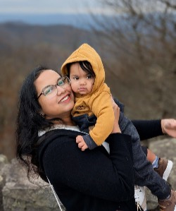 image of Rafi Khatun holding her baby 