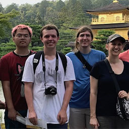 SVAD students smiling in front of trees in Japan