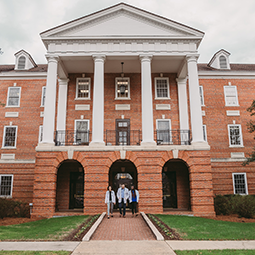 Students Walking Out of Building Three