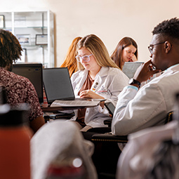 Students studying around a table