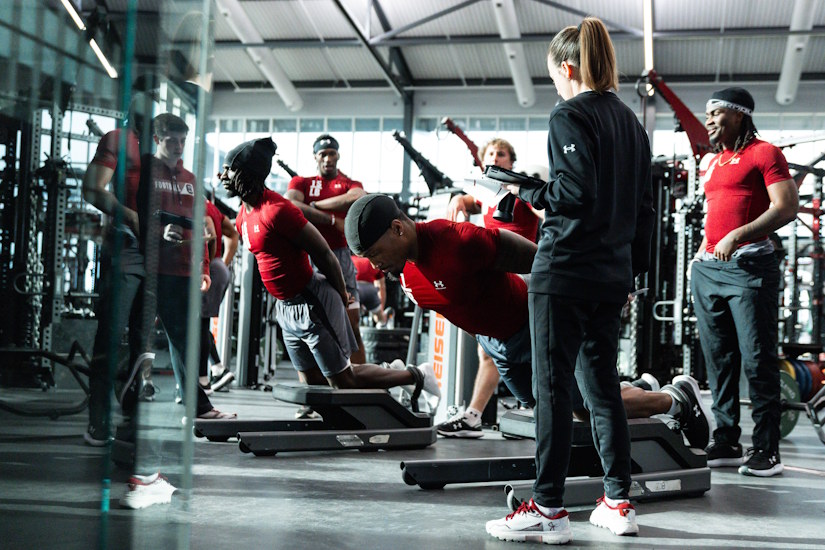 Emma Worley at a workout with the football team