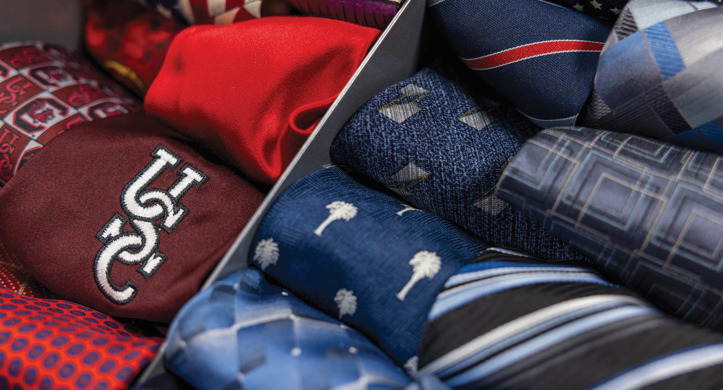 Men’s ties on display in the Gamecock CommUnity Shop.