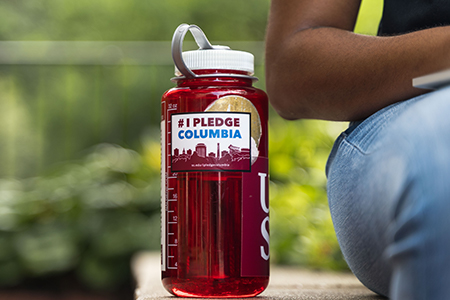 water bottle that reads I Pledge Columbia