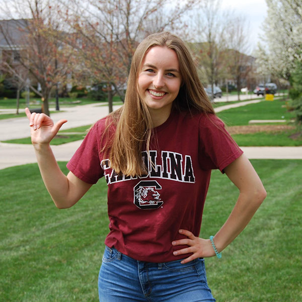 Emily Prillaman gives the spurs up sign.