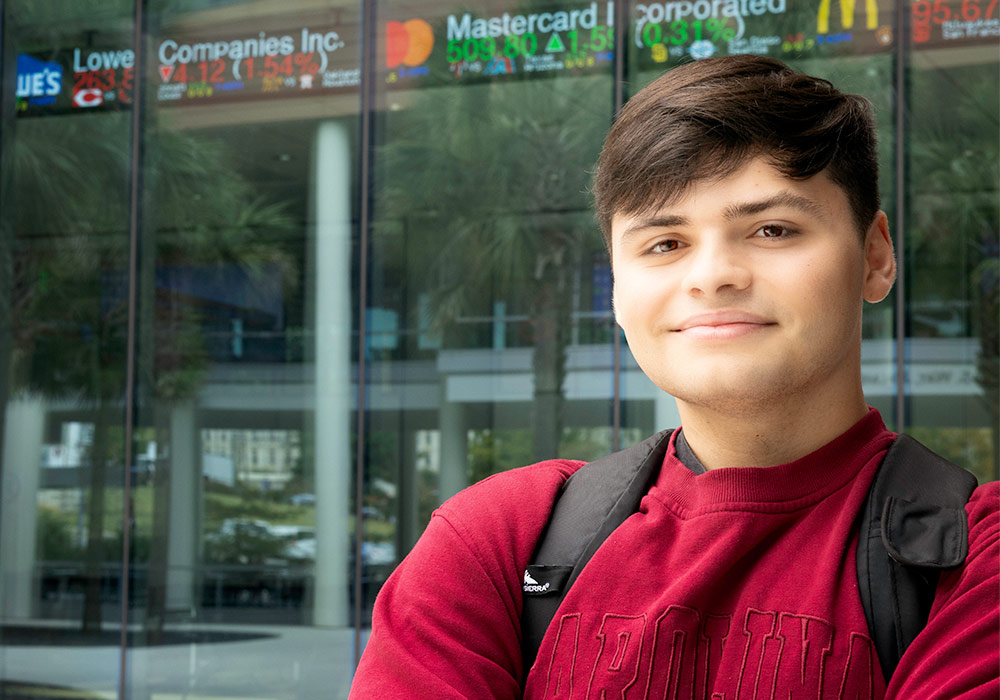 Portrait of Blaize Murphy outside the Moore School of Business